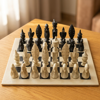 Chessboard with black and white chess pieces on a wooden table