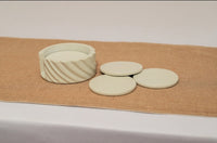 Patterned coaster sets