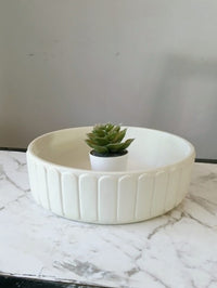 Fluted catch-all tray