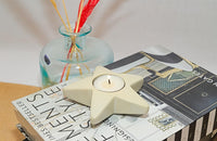 Star-shaped candle holders