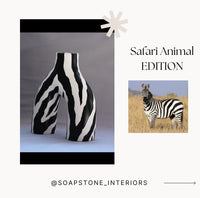 Zebra-patterned vase with a zebra image and 'Safari Animal Edition' text on a white background.